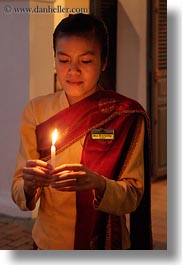 images/Asia/Laos/LuangPrabang/People/Women/Misc/woman-holding-candle-2.jpg