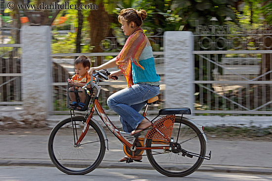 woman-on-bike-w-baby-in-basket.jpg