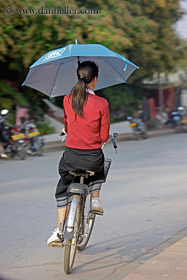 woman-on-bike-w-umbrella-1.jpg