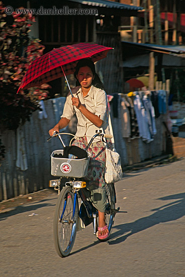 woman-on-bike-w-umbrella-2.jpg