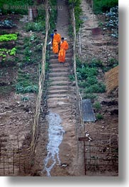 images/Asia/Laos/LuangPrabang/Scenics/Jungle/monks-on-muddy-stairs.jpg