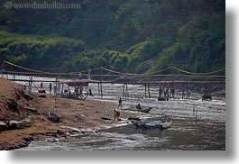 images/Asia/Laos/LuangPrabang/Scenics/River/ppl-wading-in-nam_khan-river.jpg