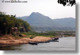 images/Asia/Laos/LuangPrabang/Scenics/River/river-bank-tree-n-mtn-2.jpg
