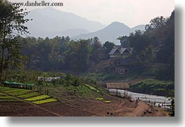 images/Asia/Laos/LuangPrabang/Scenics/River/river-house-n-mtn-1.jpg