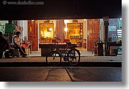images/Asia/Laos/LuangPrabang/Transportation/Bikes/bike-in-front-of-store-at-nite-1.jpg