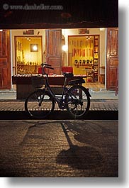 images/Asia/Laos/LuangPrabang/Transportation/Bikes/bike-in-front-of-store-at-nite-2.jpg