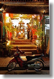 images/Asia/Laos/LuangPrabang/Transportation/Bikes/bike-in-front-of-store-at-nite-3.jpg