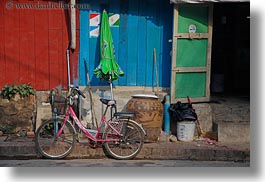 images/Asia/Laos/LuangPrabang/Transportation/Bikes/pink-bike-by-green-umbrella-2.jpg