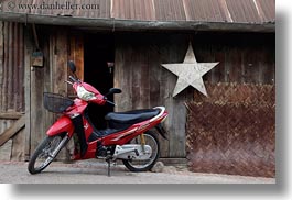 images/Asia/Laos/LuangPrabang/Transportation/Bikes/red-motorcycle-by-star.jpg