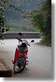 images/Asia/Laos/LuangPrabang/Transportation/Bikes/red-motorcycle-on-street-alone.jpg
