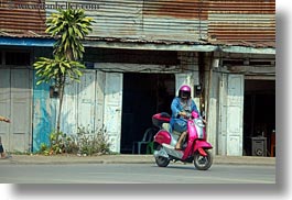 images/Asia/Laos/LuangPrabang/Transportation/Bikes/woman-on-pink-motorcycle.jpg