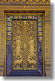 images/Asia/Laos/LuangPrabang/WatChoumkhong/ornate-apsara-door-1.jpg