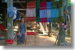images/Asia/Laos/LuangPrabang/WeavingVillage/old-woman-n-fabrics.jpg