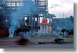 images/Asia/Laos/Vientiane/busy-scene-w-motorcyclist.jpg