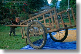 images/Asia/Laos/Villages/Hmong-1/baby-n-big-cart.jpg