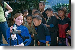 images/Asia/Laos/Villages/Hmong-1/tourist-showing-video-to-children.jpg