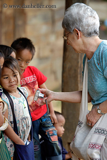 woman-showing-camera-to-kids.jpg