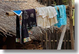 images/Asia/Laos/Villages/Hmong-3/Misc/thatched-hut-w-hanging-laundry-4.jpg