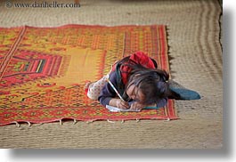 images/Asia/Laos/Villages/Hmong-3/School/girl-w-pencil-n-paper-on-rug-2.jpg