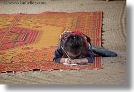 images/Asia/Laos/Villages/Hmong-3/School/girl-w-pencil-n-paper-on-rug-3.jpg