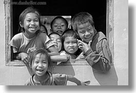 images/Asia/Laos/Villages/RiverVillage1/BW/kids-playing-at-window-3-bw.jpg