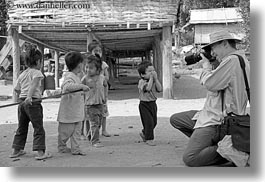 images/Asia/Laos/Villages/RiverVillage1/BW/man-photographing-toddlers-3-bw.jpg