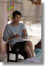 images/Asia/Laos/Villages/RiverVillage1/Boys/man-weaving-2.jpg