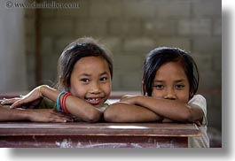 images/Asia/Laos/Villages/RiverVillage1/Girls/girls-at-school-desk-1.jpg