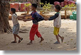 images/Asia/Laos/Villages/RiverVillage1/Groups/children-pulling-shirts-1.jpg