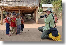 images/Asia/Laos/Villages/RiverVillage1/Groups/man-photographing-toddlers-2.jpg