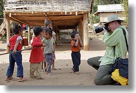 images/Asia/Laos/Villages/RiverVillage1/Groups/man-photographing-toddlers-3.jpg