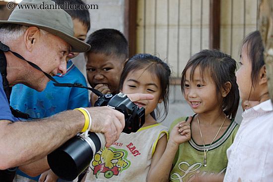 man-showing-camera-to-kids-1.jpg