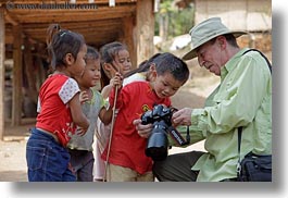 images/Asia/Laos/Villages/RiverVillage1/Groups/man-showing-camera-to-kids-3.jpg