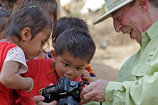 man-showing-camera-to-kids-4a.jpg