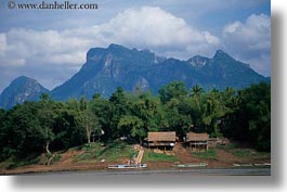 images/Asia/Laos/Villages/RiverVillage2/thatched-roof-hut-n-mtns-1.jpg