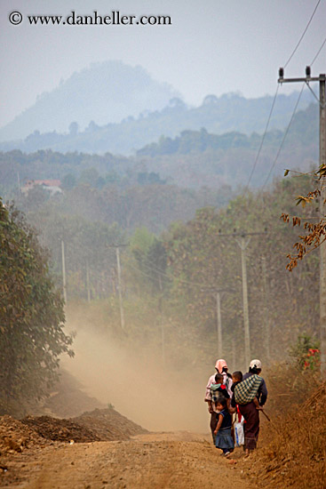 family-walking-on-dirt-road-w-mtns.jpg