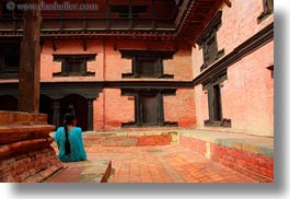 images/Asia/Nepal/Kathmandu/Museum/woman-in-blue-in-courtyard.jpg
