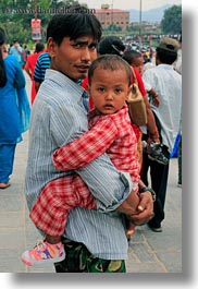 images/Asia/Nepal/Kathmandu/Pashupatinath/Men/father-carrying-son.jpg