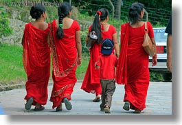 images/Asia/Nepal/Kathmandu/Pashupatinath/Women/boy-following-girls-in-robes.jpg