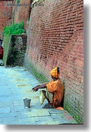 images/Asia/Nepal/Kathmandu/Pashupatinath/Women/woman-by-brick-wall.jpg