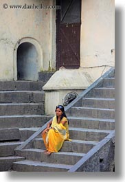 images/Asia/Nepal/Kathmandu/Pashupatinath/Women/woman-in-yellow-on-stairs-02.jpg