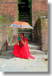 images/Asia/Nepal/Kathmandu/Pashupatinath/Women/woman-w-umbrella-01.jpg