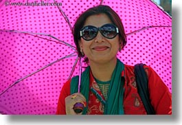 images/Asia/Nepal/Kathmandu/Pashupatinath/Women/woman-w-umbrella-03.jpg