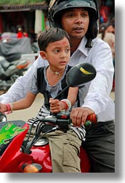 images/Asia/Nepal/Kathmandu/PatanDarburSquare/Men/father-n-son-on-moped.jpg