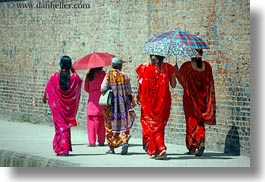 images/Asia/Nepal/Kathmandu/PatanDarburSquare/Women/women-walking-w-umbrella.jpg