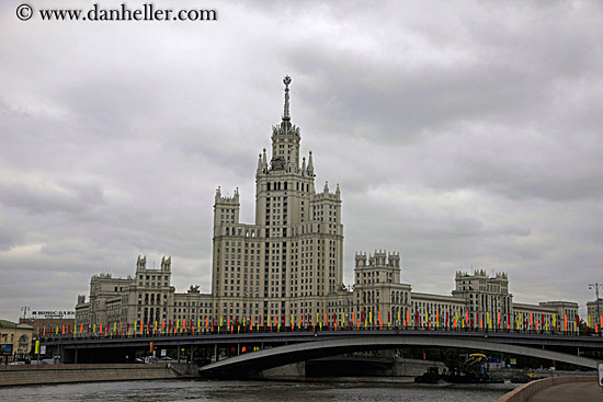 bldg-n-flags-on-bridge.jpg