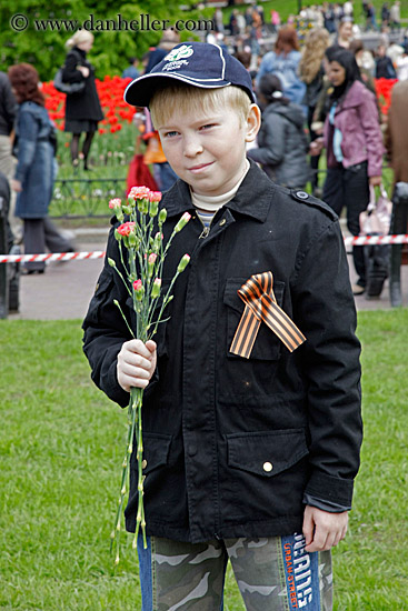 boy-posing-w-flowers.jpg