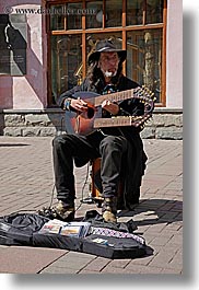 images/Asia/Russia/Moscow/People/Men/man-playing-double-neck-guitar-1.jpg