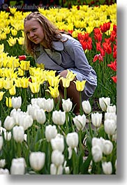 images/Asia/Russia/Moscow/People/Women/woman-posing-w-yellow-n-red-tulips-2.jpg