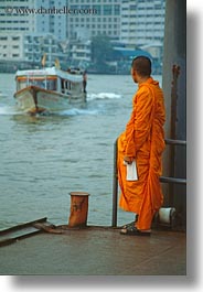 images/Asia/Thailand/Bangkok/People/monk-looking-at-river-boat.jpg
